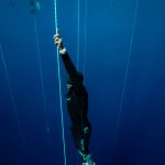 A freediver coming back from his Free Immersion dive in Blue Hole, Dahab.