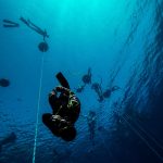 Freediving athlete strating is dive in Blue Hole, Dahab.