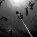 Freediving athlete strating is dive in Blue Hole, Dahab.