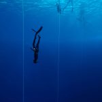 Freediver doing his constant weight dive in Blue Hole, Dahab.