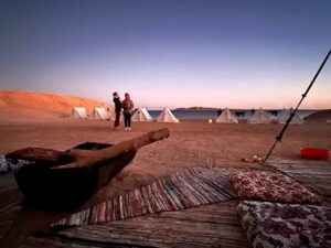 Two people talking on the beach at Ras-Mohamed national park
